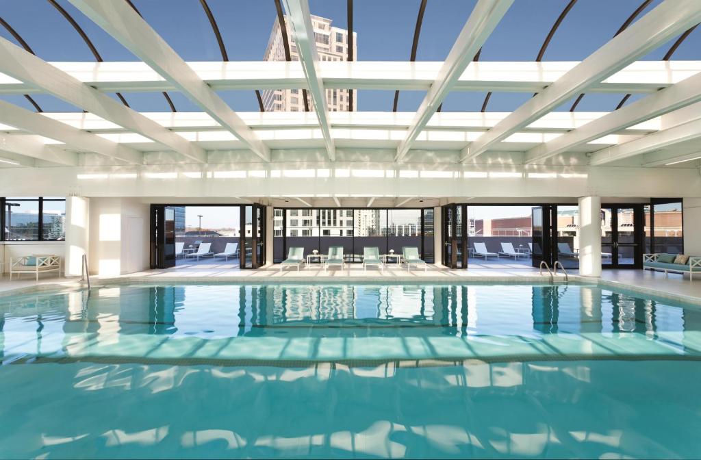 Heated indoor pool with skyline views at The Whitley
